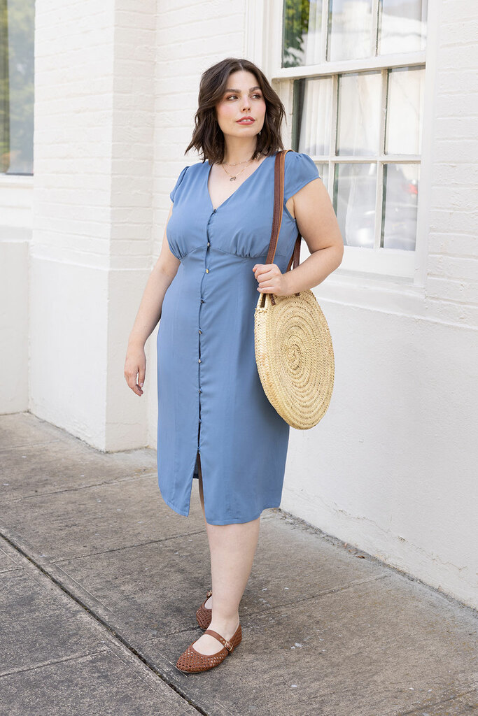 woman modeling blue lilac dress