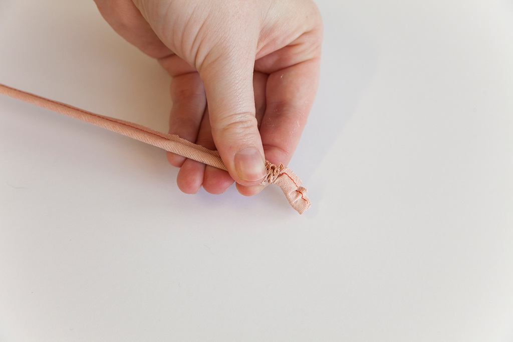 turning the button loop tube inside out