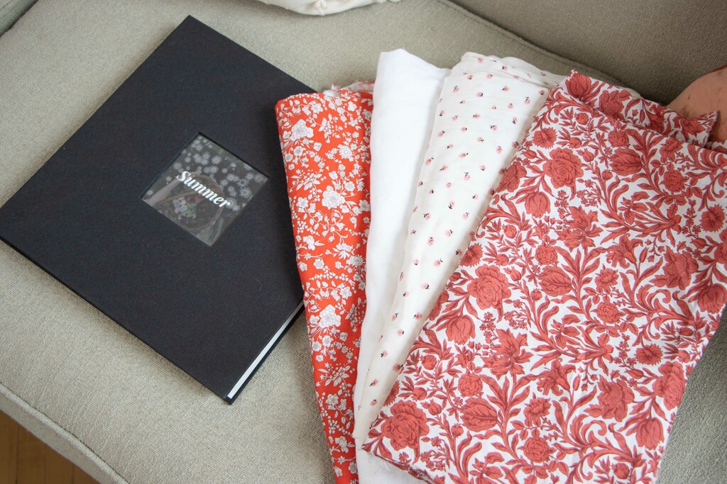 summer fabrics next to planning book