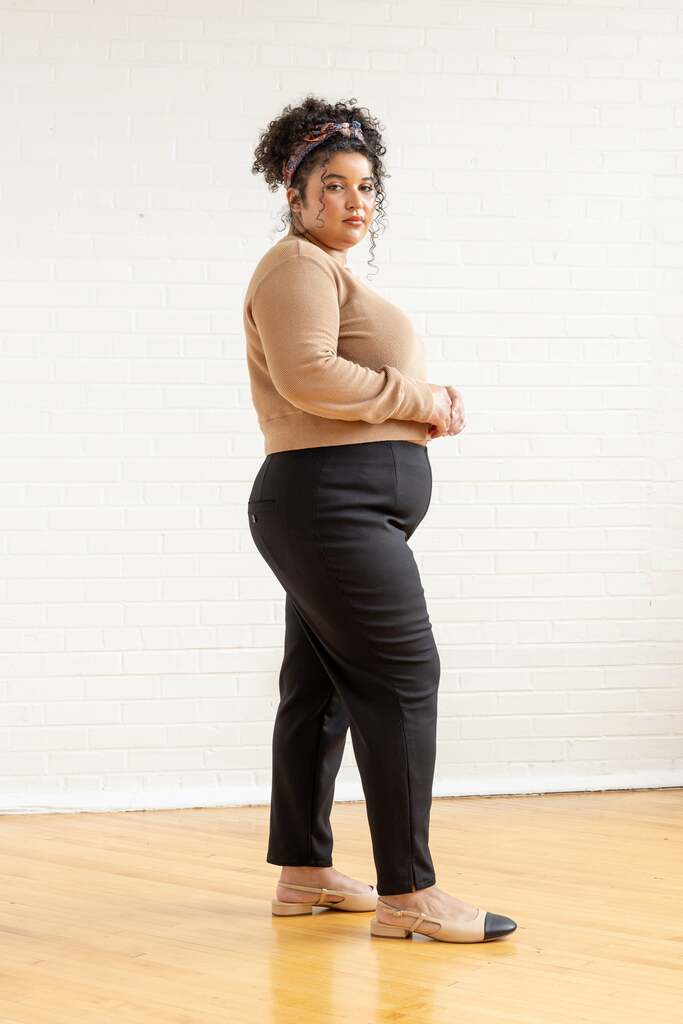 Woman wearing black Lars pants