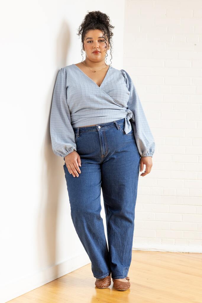 Woman wearing blue Idra top