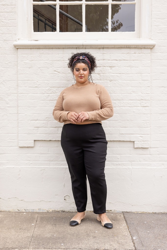 Woman modeling black Lars pants