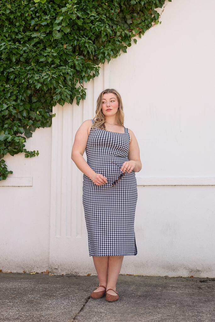 woman modeling pink and white citron dress