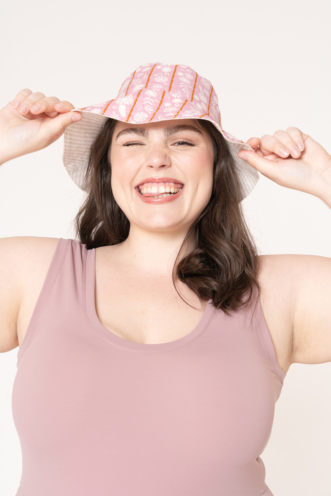 woman modeling Rey bucket hat