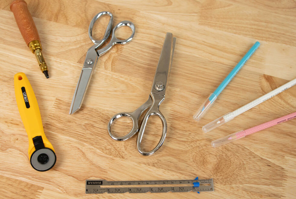image-06: Collection of high-quality sewing tools laid out on a table