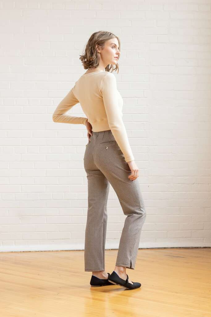 Woman wearing black and white Lars pants