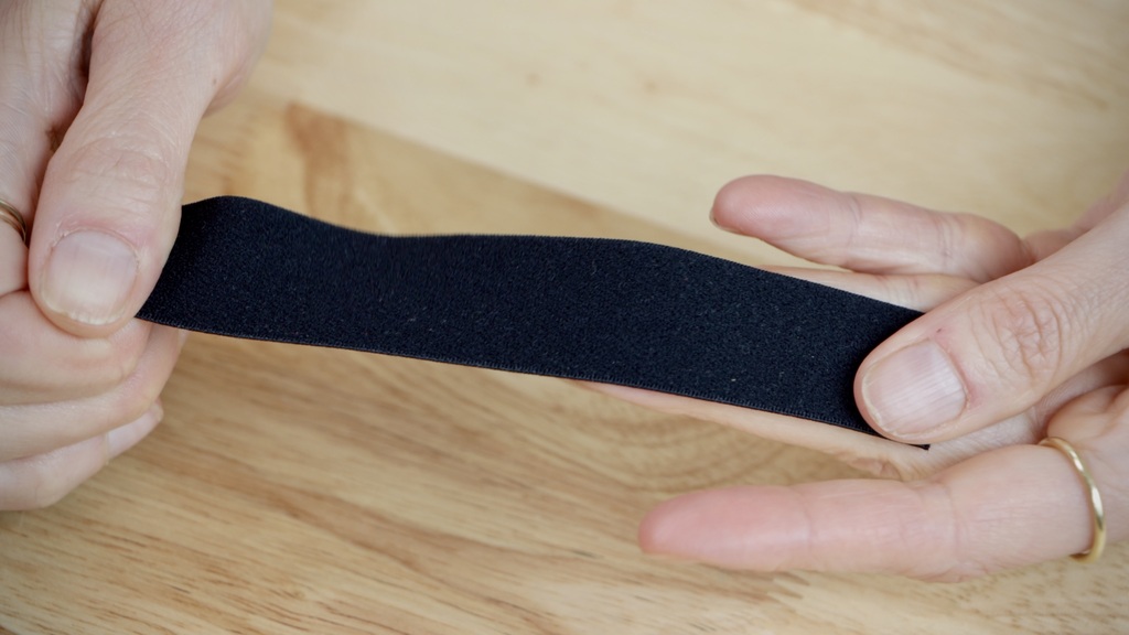 Close-up of plush-back elastic showing both the soft and smooth sides
