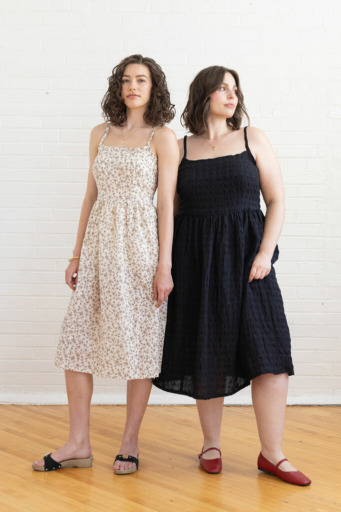 women modeling black and floral Mora dresses