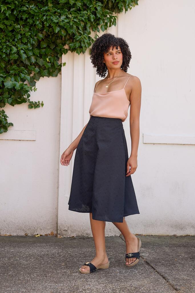 Woman modeling Arbor skirt in black
